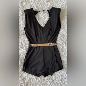 Chic Black and Gold Romper with Modern Silhouette